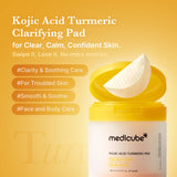 Medicube Kojic Acid Tumeric Face Toner Pads with textured surface for gentle exfoliation and brightening treatment.