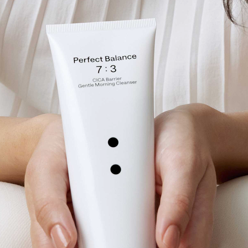 B : Lab CICA Barrier Gentle Morning Cleanser in a white tube with green accents, suitable for sensitive skin and gentle cleansing.