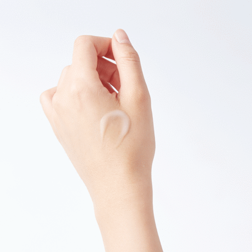 Close-up of SHOPIFY_ME Zero Pore Serum from the ZERO LINE, showing the sleek bottle and serum texture for pore care.
