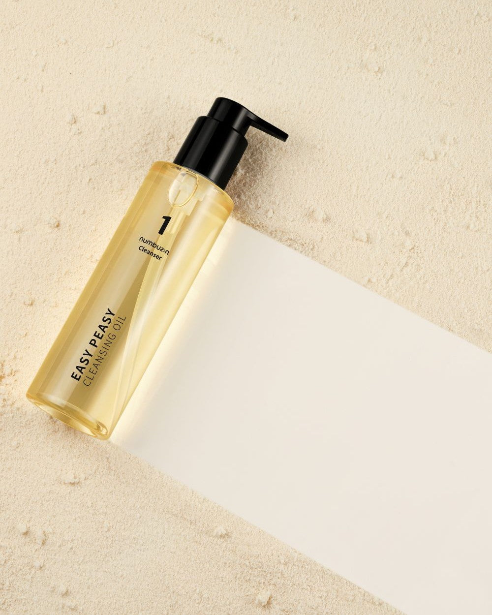 Numbuzin No.1 Easy Peasy Cleansing Oil bottle and pump for gentle facial cleansing, displayed on a clean surface.