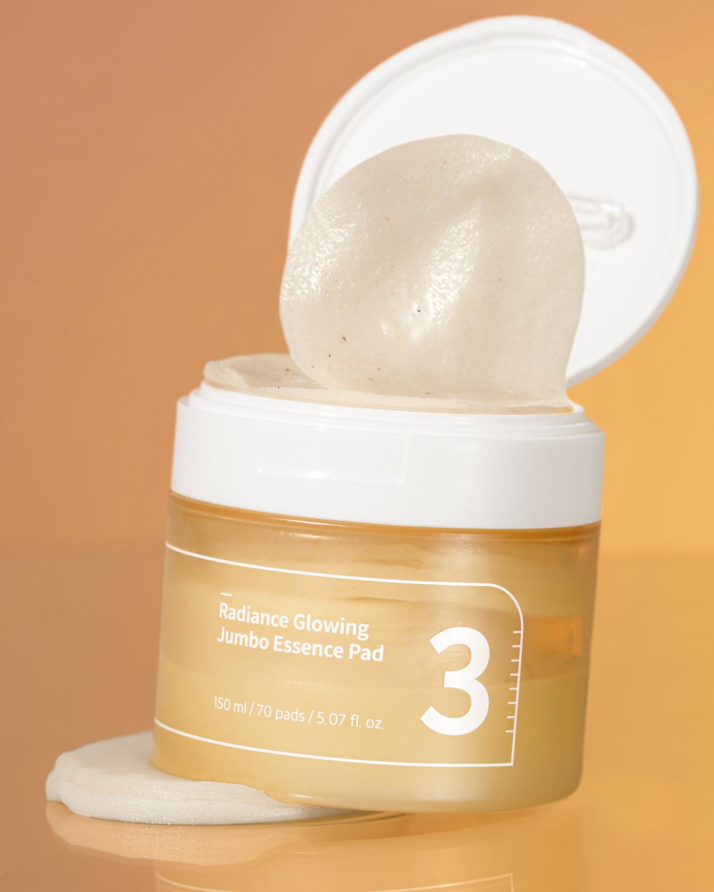 Numbuzin No.3 Radiance Glowing Jumbo Essence Pads, toner pads with exfoliating and brightening ingredients, displayed in a jar.