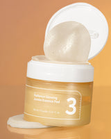 Numbuzin No.3 Radiance Glowing Jumbo Essence Pads, toner pads with exfoliating and brightening ingredients, displayed in a jar.