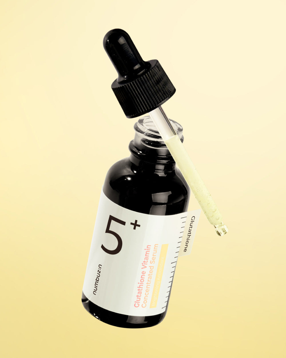Numbuzin No.5+ Glutathione Vitamin Concentrated Serum bottle with dropper, showcasing the skincare product packaging.