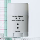 B : Lab Matcha Airyfit Sun Stick SPF50+ PA++++ sunscreen with green tea extract in a sleek stick format for easy sun protection.