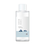 ROUND LAB 1025 Dokdo Toner in a clear 200ml bottle, featuring minimalist design and transparent liquid inside.