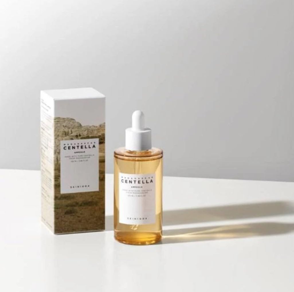 SKINZA Madagascar Centella Ampoule bottle with dropper, featuring clear liquid and label, designed for skincare and soothing skin.