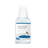 ROUND LAB Birch Juice Moisturising Serum 50ml in a clear glass bottle with a white pump dispenser.
