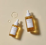 SKINZA Madagascar Centella Ampoule bottle with label, clear glass container showcasing skincare product for soothing and healing skin.