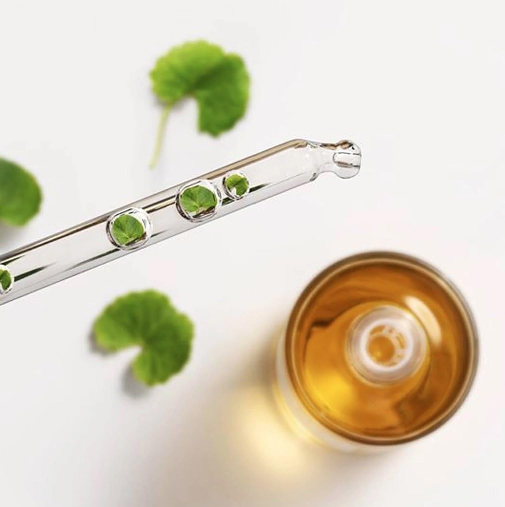 SKINZA Madagascar Centella Ampoule bottle with label and dropper, skincare product for soothing and healing skin.