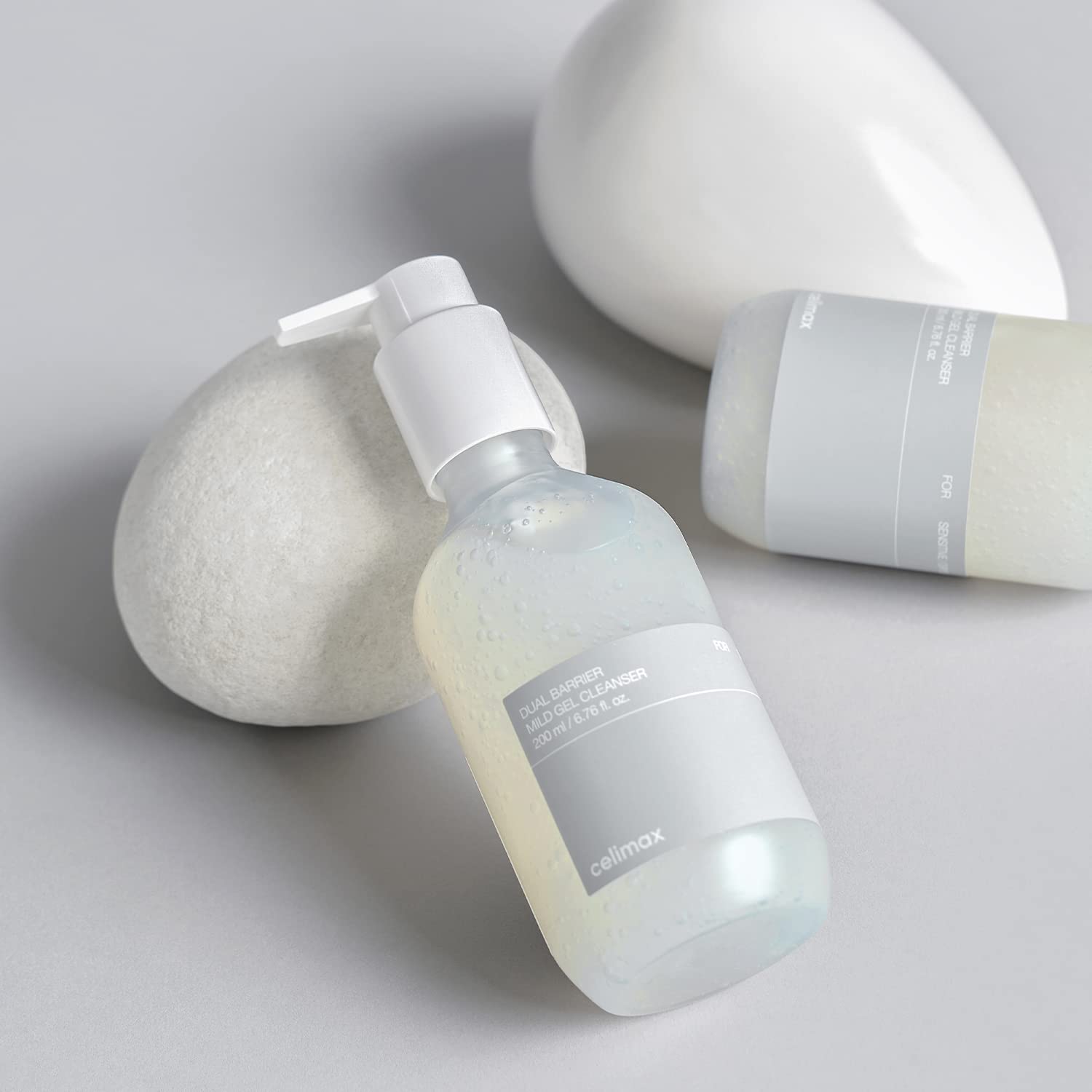 Celimax Dual Barrier Mild Gel Cleanser with ceramide, showing the clear gel in a pump bottle, designed for gentle skin cleansing.
