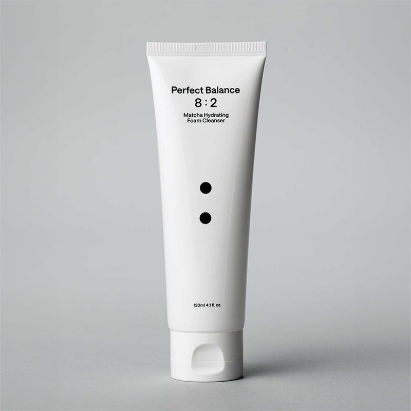 B : Lab Matcha Hydrating Foam Cleanser in a white bottle with a green label, showing the product's foam texture.
