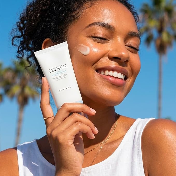 SKINZA SKIN1004 Madagascar Centella Hyalu-Cica Water-Fit Sun Serum in a clear tube with a white pump dispenser and blue label