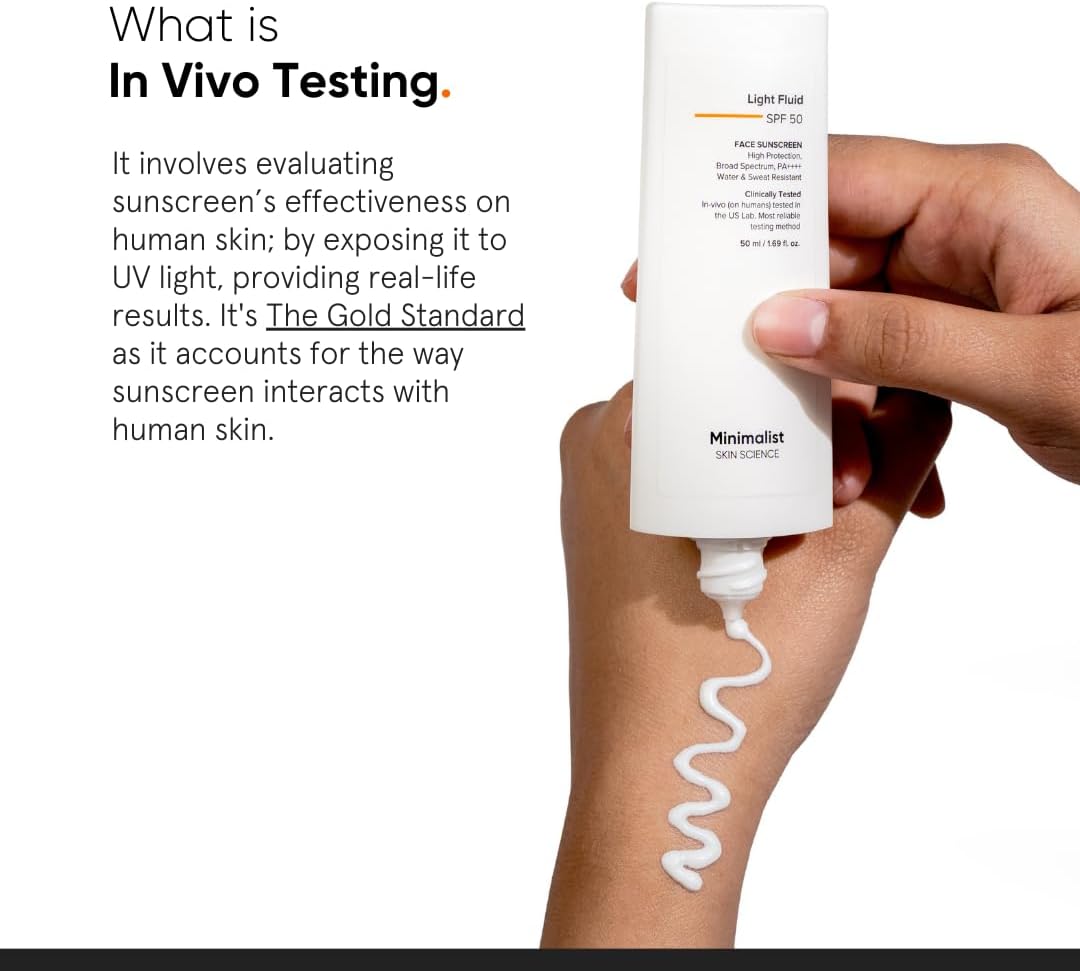 SKINZA minimalist SPF 50 Light Fluid Sunscreen bottle with pump dispenser, lightweight and protective skincare product.