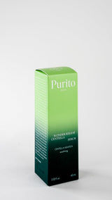 Purito Centella Unscented Serum in a clear glass dropper bottle with white label, showcasing the skincare product from Purito Seoul.