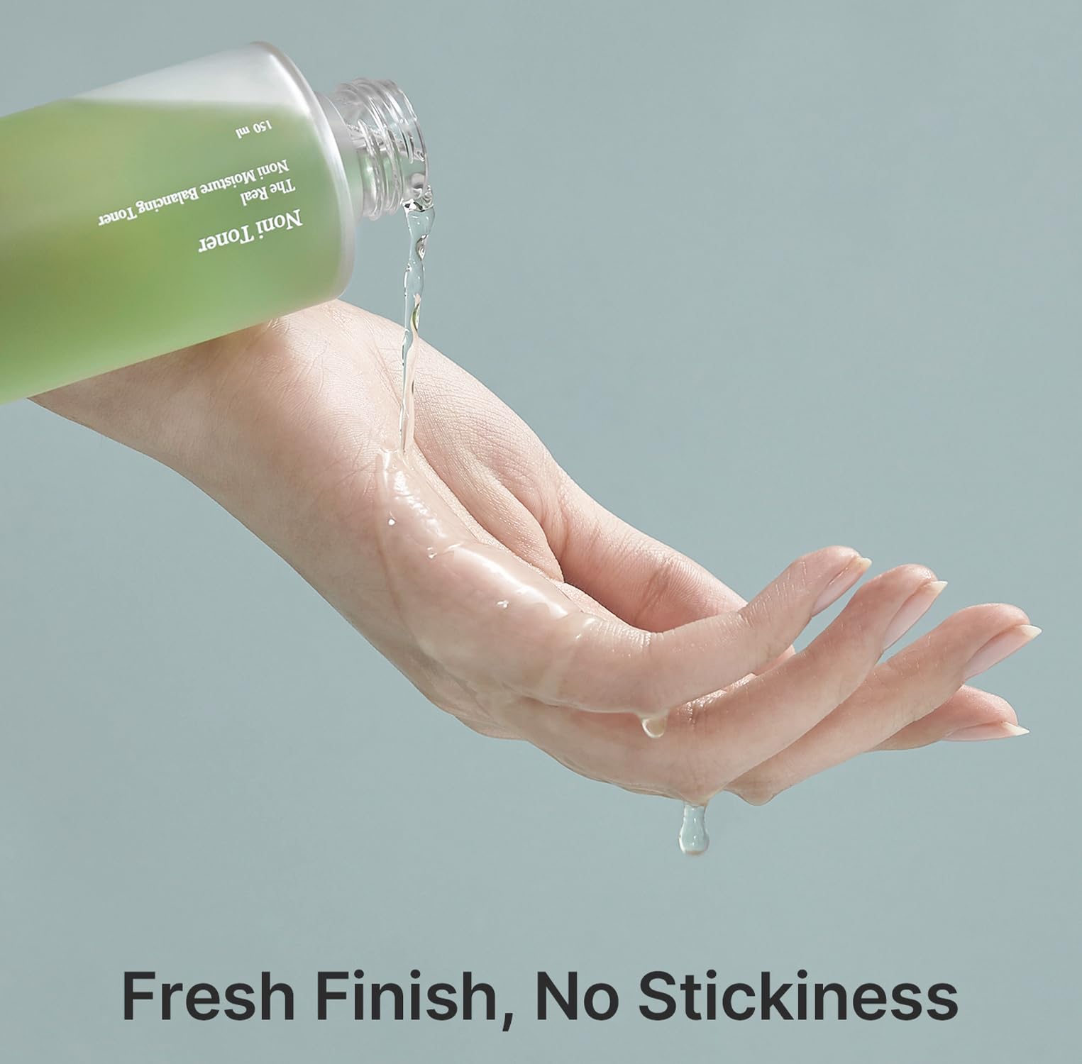 Celimax Noni Moisture Balancing Toner in a clear bottle with a light-colored label, showing the toner inside.