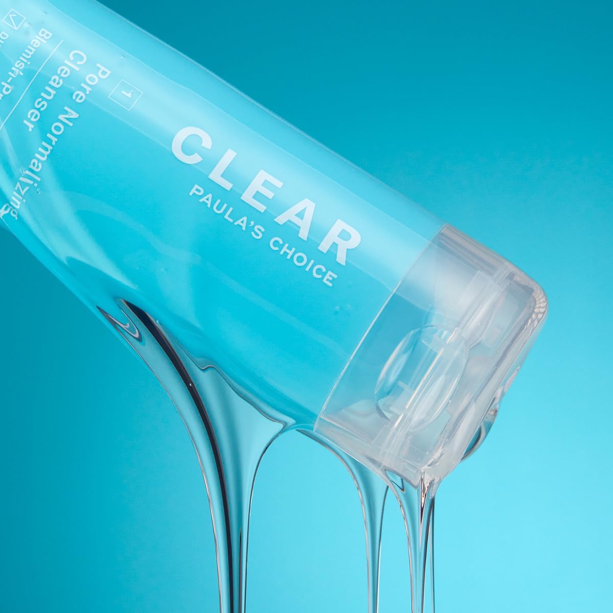 SKINZA Paula's Choice CLEAR Pore Normalizing Cleanser in a pump bottle, designed for oily and acne-prone skin, with a clear liquid formula.