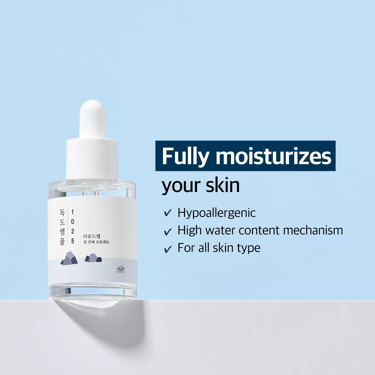 ROUND LAB 1025 Dokdo Ampoule 45g in a glass bottle with a pump, featuring a clear serum with a lightweight, moisturizing texture.