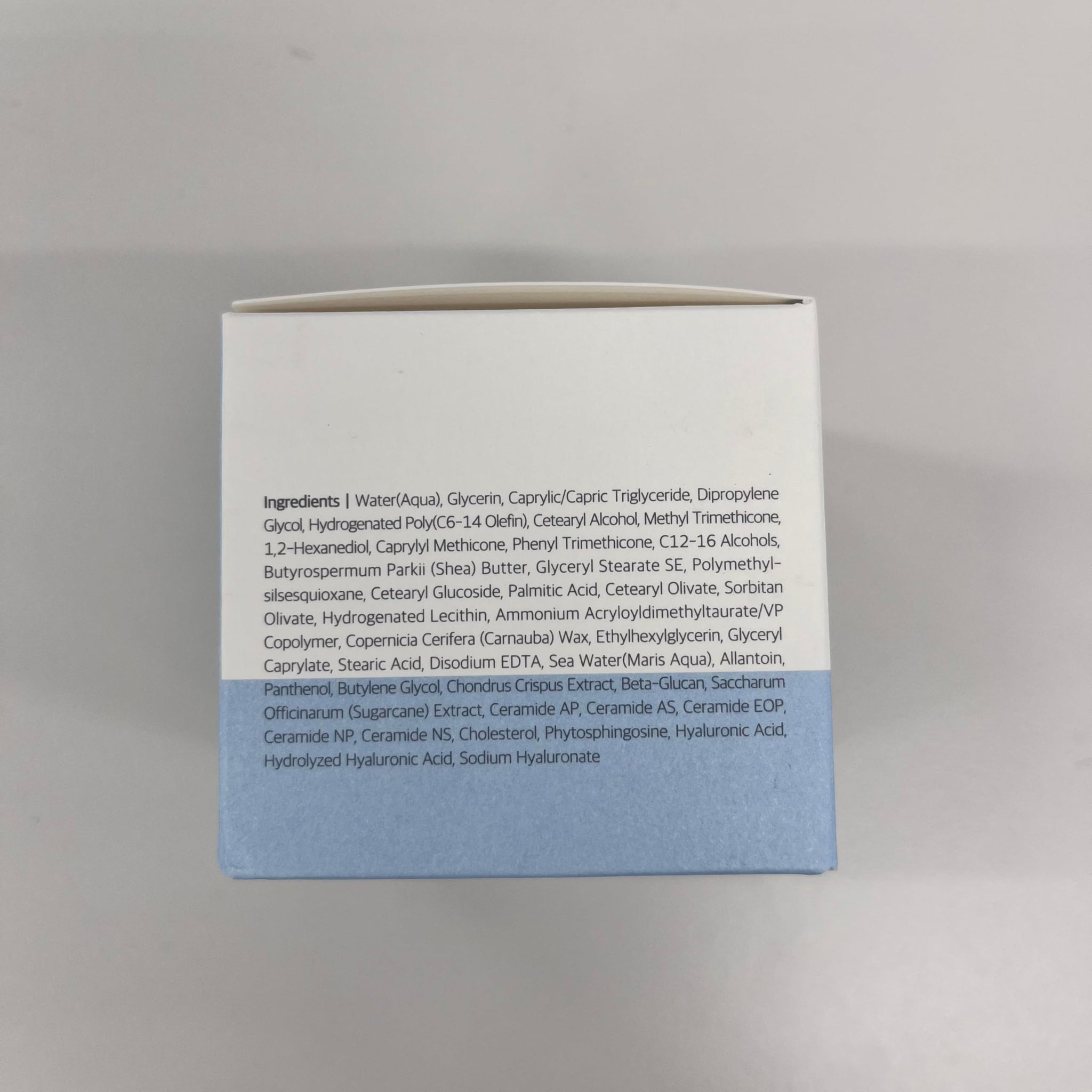 ROUND LAB 1025 Dokdo Cream in a jar, showcasing its smooth, creamy texture and packaging for skincare hydration.