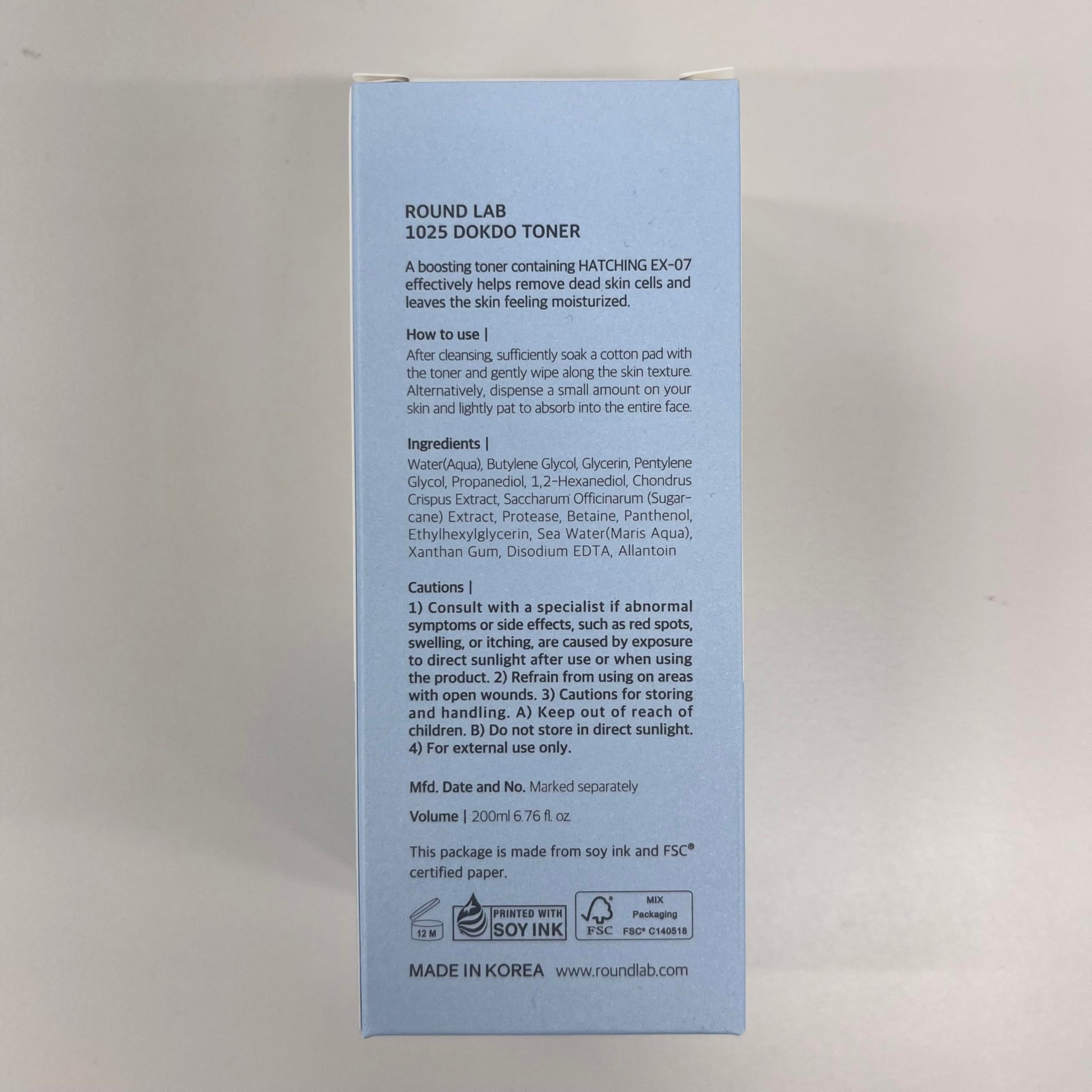 ROUND LAB 1025 Dokdo Toner in a clear 200ml bottle with a minimalist label and white cap, displayed on a neutral background.