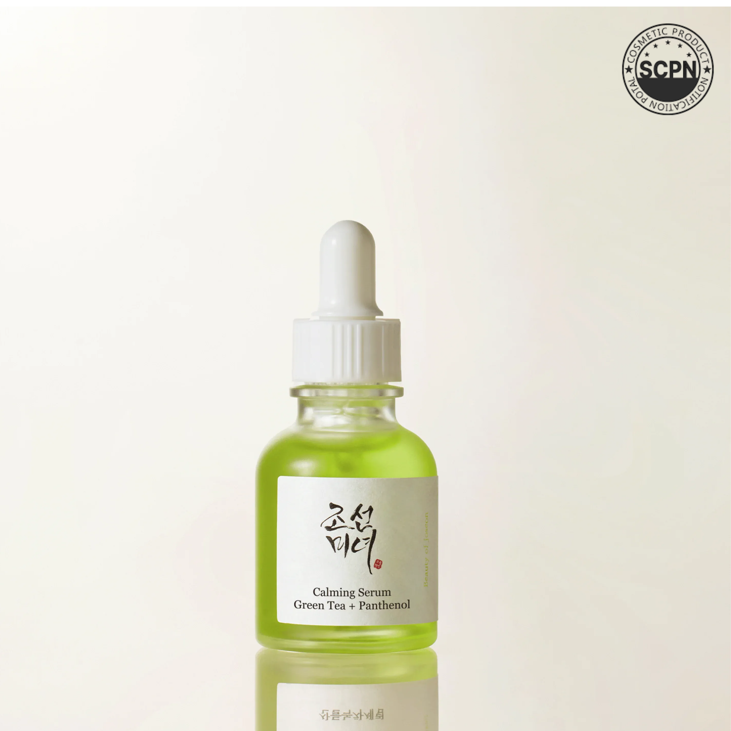 Beauty of Joseon Calming Serum with green tea and panthenol for soothing face care, shown in a clear bottle with a pump dispenser.