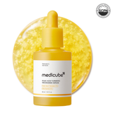 Medicube Kojic Acid Turmeric Capsule Serum in a sleek bottle, showing the serum's smooth texture and vibrant yellow color.