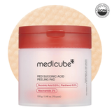 Red Succinic Acid and Panthenol pads from Medicube's RED LINE acne care range, showing stacked skincare pads with packaging.