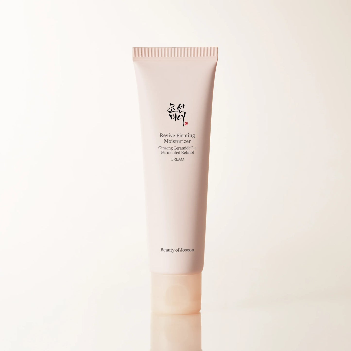 Beauty of Joseon Revive Firming Moisturizer with Ginseng and Retinol for face care, shown in a sleek jar.
