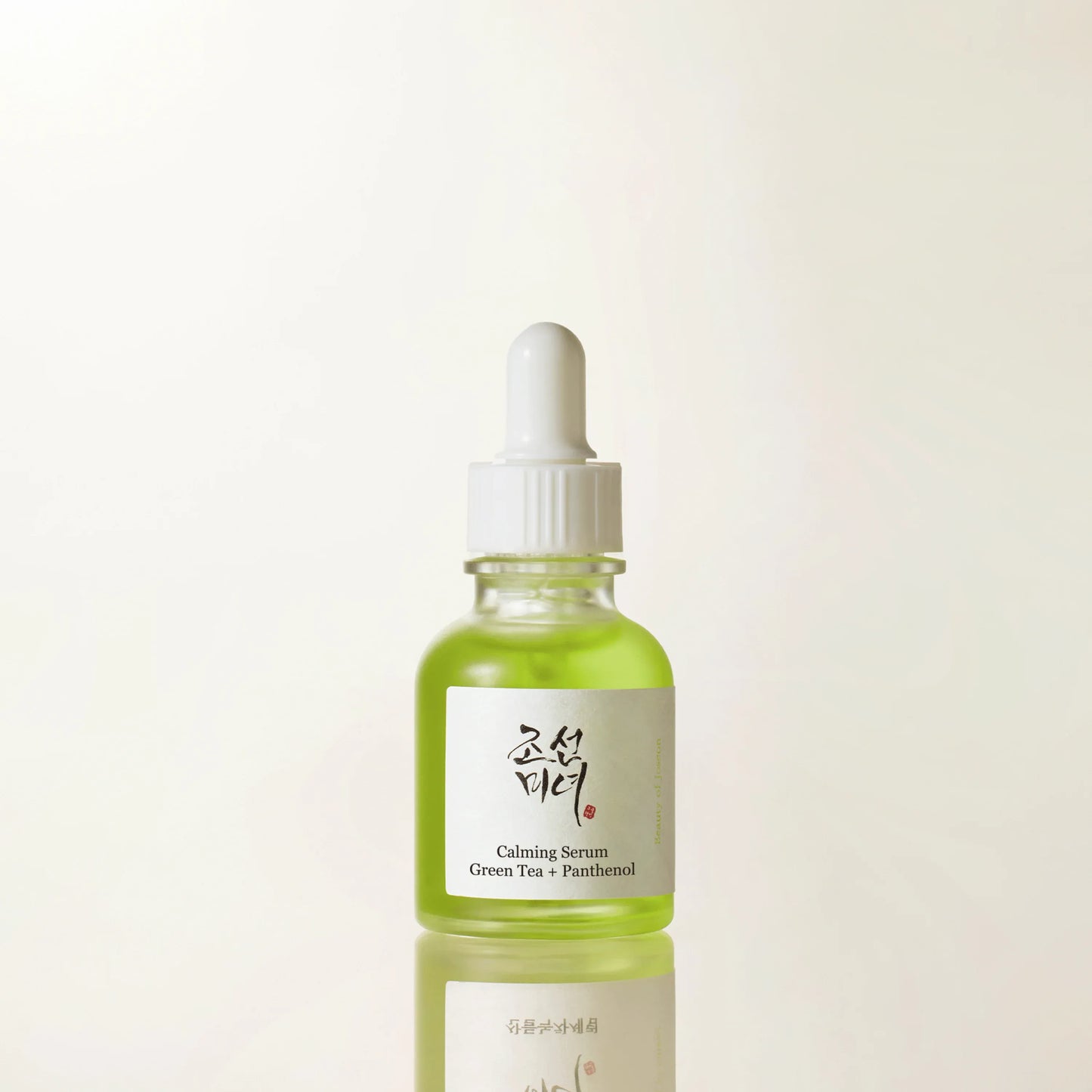 Beauty of Joseon calming serum with green tea and panthenol in a clear glass bottle, front view showing the label and dropper.