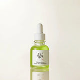 Beauty of Joseon calming serum with green tea and panthenol in a clear glass bottle, front view showing the label and dropper.