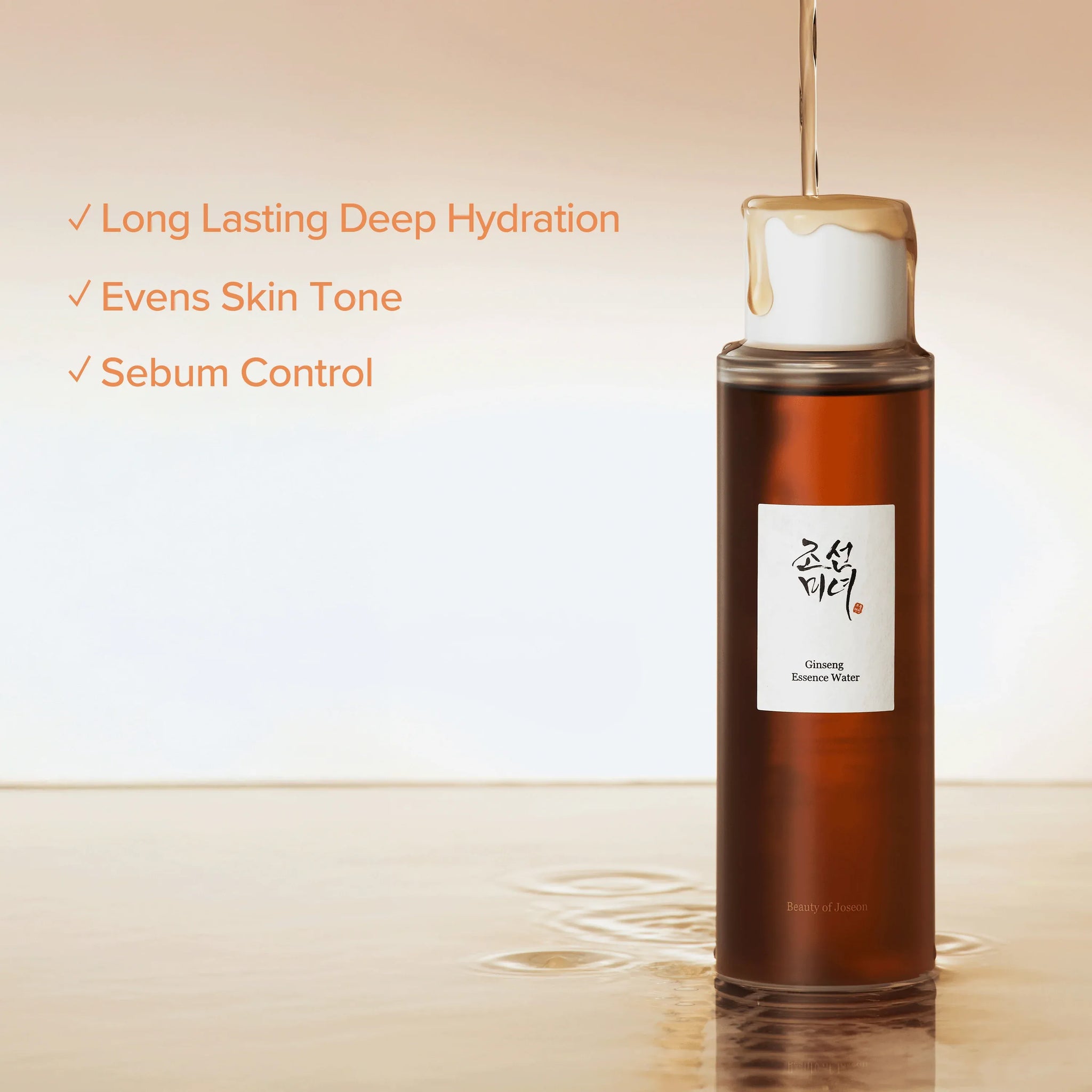 Bottle of Beauty of Joseon Ginseng Essence Water for face care, featuring clear liquid and traditional Korean packaging.